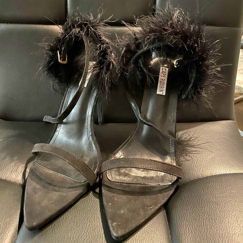 Black feathered heels